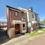 Modern semi-detached house with driveway and front garden.
