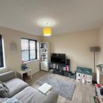 Cosy living room with toys and modern decor.