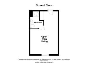 Ground floor plan with open living and bathroom.