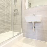 Modern bathroom with shower and basin