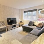 Cosy living room with modern decor and TV