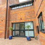 Silverstone House entrance with plants.