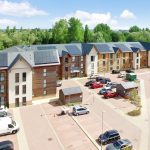 Eco-friendly residential building with solar panels.