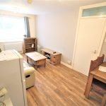 Cosy living room with wooden furniture.