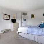 Cosy bedroom with double bed and decor