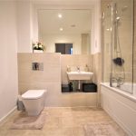 Modern bathroom with sink and bathtub