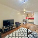 Modern living room and open kitchen space