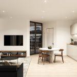 Modern open-plan kitchen and living area with view.