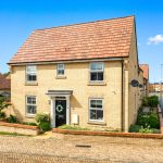 Modern brick house with red tiled roof
