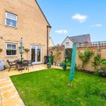 Modern garden patio with table and chairs