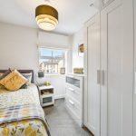Cosy bedroom with single bed and wardrobe