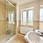 Modern bathroom with shower and window view