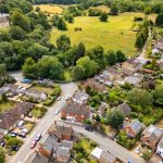 Aerial view of countryside village and landscape.