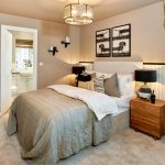 Cosy bedroom with en-suite, modern decor and furnishings.