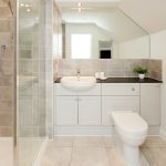 Modern bathroom with shower and elegant fixtures