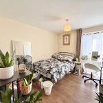 Cosy bedroom with plants and natural light