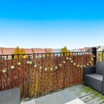 Cosy balcony with chairs and garden view