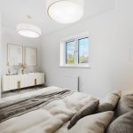 Modern bedroom with natural light and decor