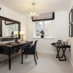 Elegant home office with desk and chair.