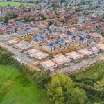 Aerial view of housing development under construction.