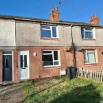 Terraced houses with brick and stucco facade