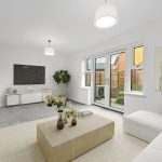 Modern living room with large window and artwork.