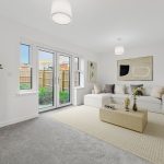 Modern living room with white sofa and art decor.