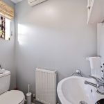 Small bathroom with toilet and sink