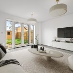Modern living room with garden view.