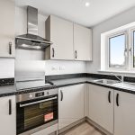 Modern kitchen with oven and sink
