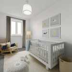 Minimalist nursery with cot and rocking chair.