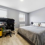 Modern bedroom with desk and chair