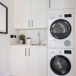 Compact laundry area with modern appliances
